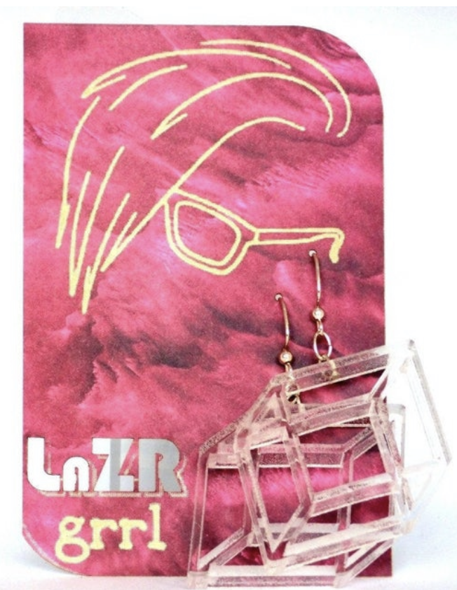 transparent acrylic earrings shaped like the three-dimensional frame of a cubic crystal